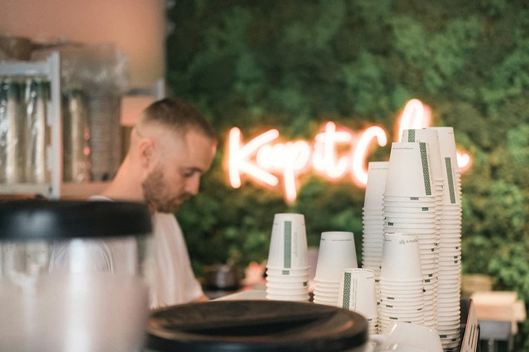 Wedding guests enjoying coffee service outdoors