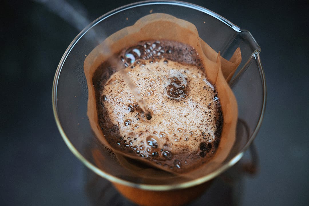 Nitro cold brew coffee being served at an event